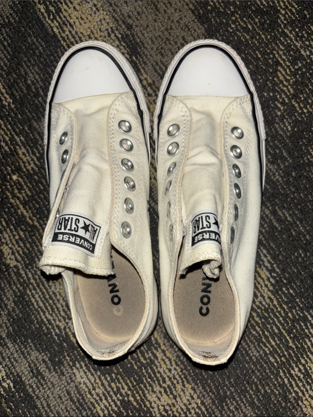 Converse women’s Canvas Slip-On Sneakers in White